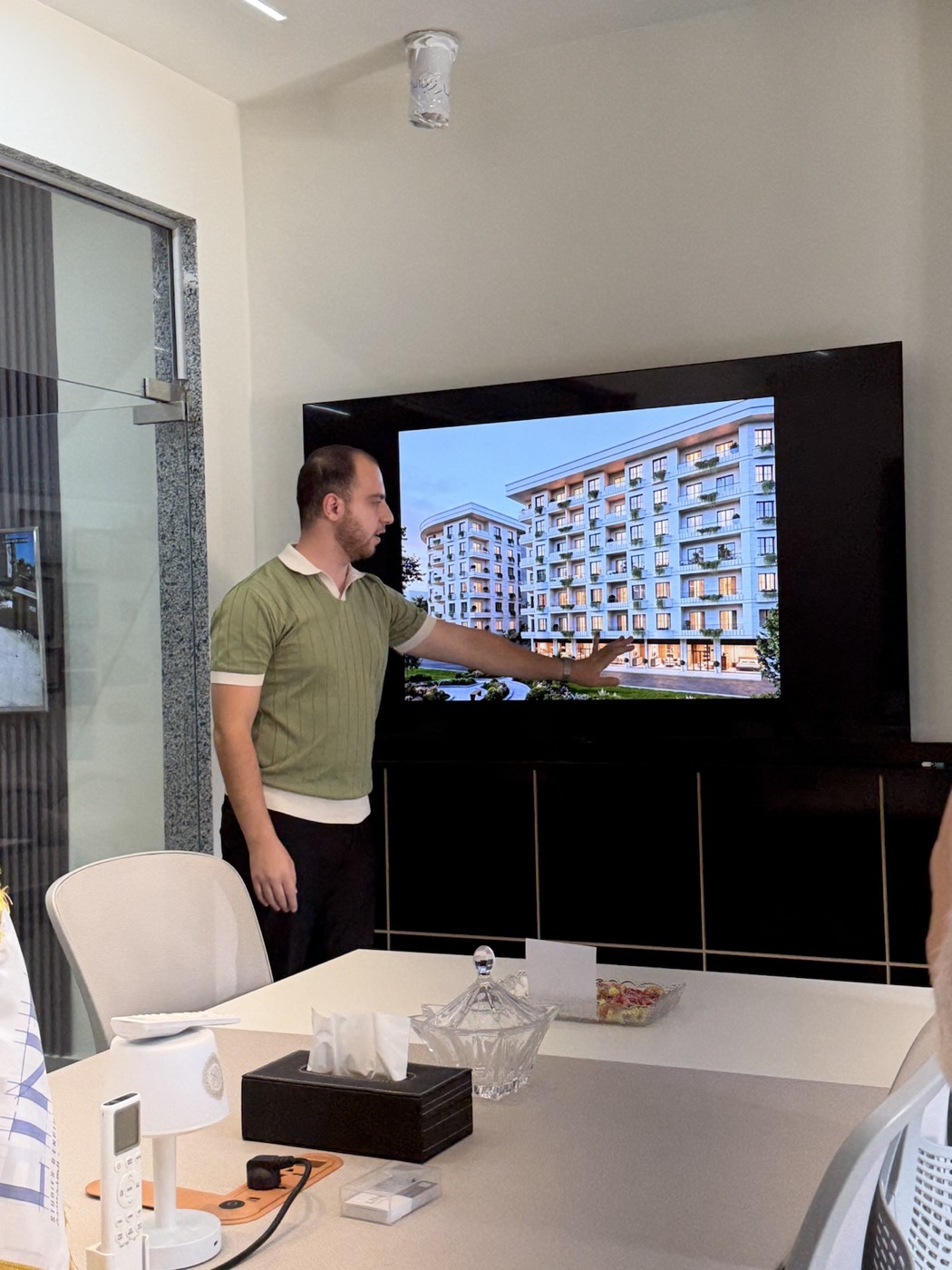 Architect presenting a residential design during an internal LINE review
