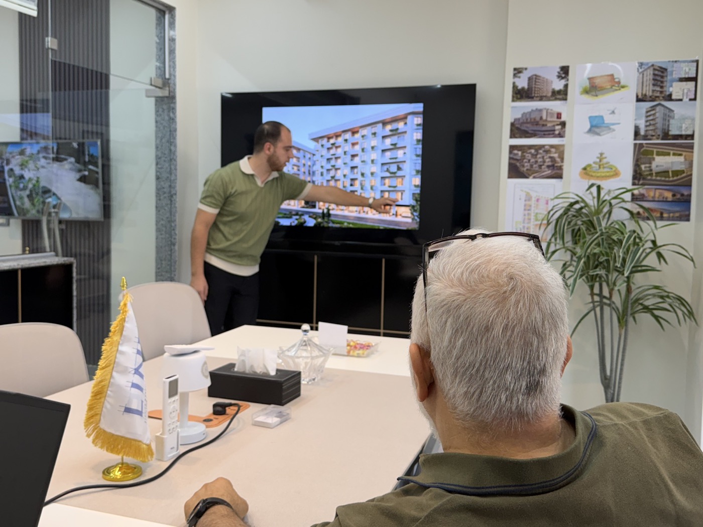 LINE leadership and project team reviewing an architectural proposal